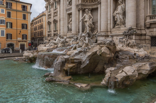 Rome Italy 11 May 2014 The Trevi Fountain in Rome attracts large crowds of people and is the worlds largest Baroque fountain and a famous landmark of the city