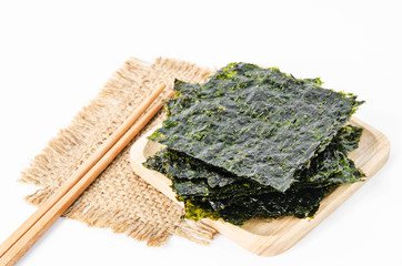 Japanese food nori dry seaweed sheets. - obrazy, fototapety, plakaty