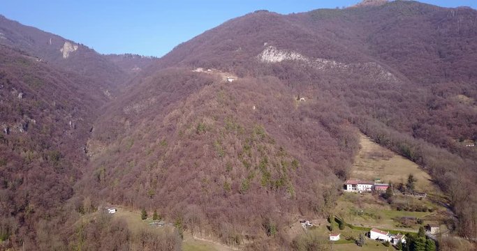 Drone aerial view of the mountains around Albino (Bergamo) in winter season. Landscape to Rena and Cornagiera mountain 