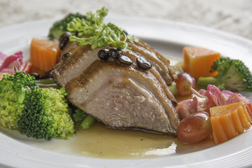 Roasted duck with coffee bean.