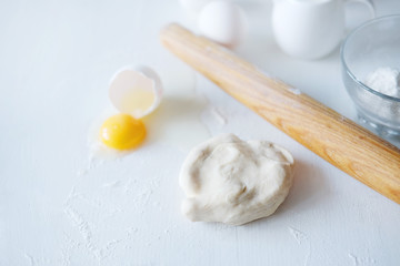 Cooking stages. Preparing dough for pies ingredients on table. © different_nata