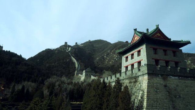 The famous landmark of China. The great wall of China with mountain view