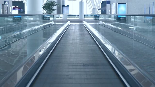 Empty modern escalator in the international airport hall