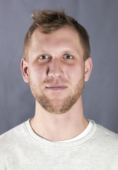 Fototapeta premium Portrait of the young smiling man