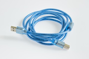 Blue USB cables connecting computer