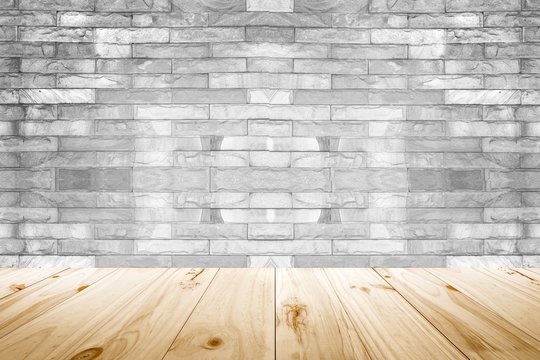 Wood table and white concrete wall background / Vintage wall of gray and desk 