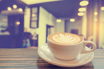 cup of coffee on table in cafe