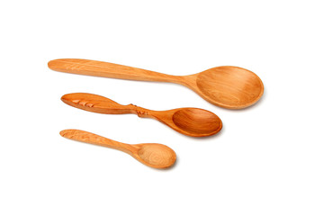Wooden spoons handmade isolated.
