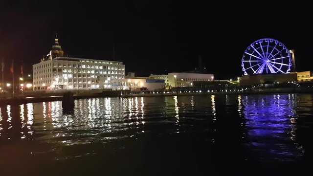 Pan timelapse of Helsinki skywheel, at a dark new years evening night, in Helsinki, Finland