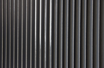 Black metal building ventilation grille