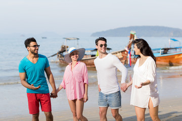 Obraz premium Young People Group On Beach Summer Vacation, Happy Smiling Friends Walking Seaside Sea Ocean Holiday Travel