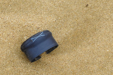 Many kind of rubbishes on the beach.