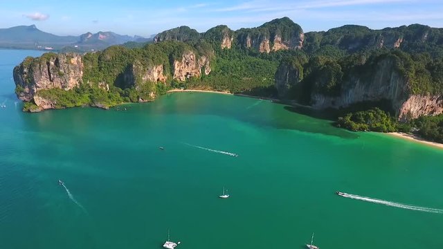 Popular Touristic Railey beach HD slowmotion aerial view. Ao Nang, Krabi Province, Thailand.