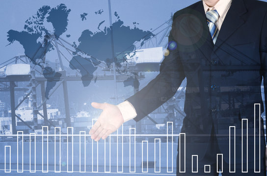 Double exposure businessman shaking hand on port cargo crane, container, financial graph chart, Elements by NASA..
