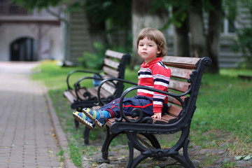 boy kid bench parl alone