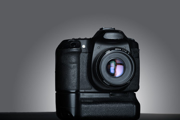 shot of dslr camera in gray background