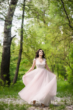 pretty bride in wreath outdoor