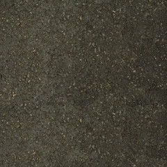 Close detail of wet asphalt background
