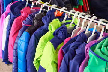 Winter children sports jacket on hanger in store
