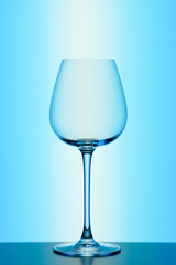 wineglass on blue background