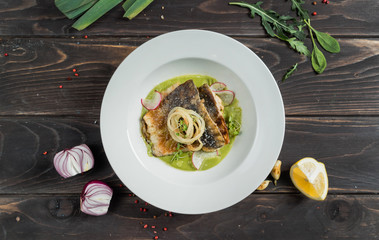 carp fillet with cream of celery and lemon sauce