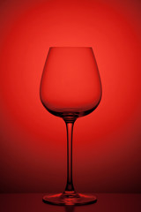 wineglass on red background