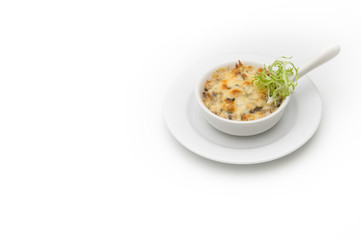 Julienne with chicken and mushrooms in a white bowl