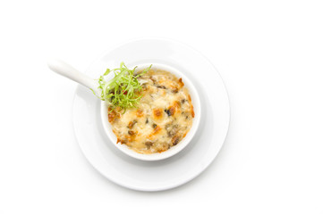Julienne with chicken and mushrooms in a white bowl