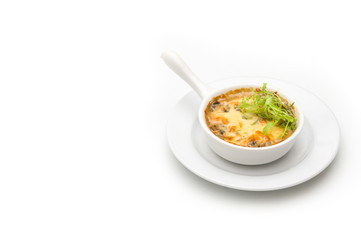 Julienne with chicken and mushrooms in a white bowl