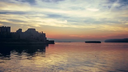 HD timelapse video of a sunset and moonrise over a medieval fortress - Powered by Adobe
