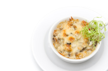 Julienne with chicken and mushrooms in a white bowl