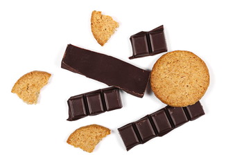 chocolate bars and round wholewheat biscuits with hazelnut isolated on white background
