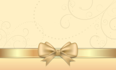 Gift card with golden ribbon and bow.