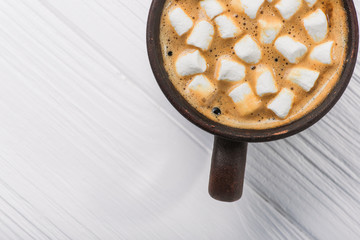 tasty coffee cup with marshmallow