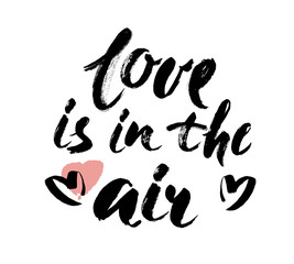 Love is in the air hand lettering. Hand drawn card design. Brush Lettering Design. Vector illustration