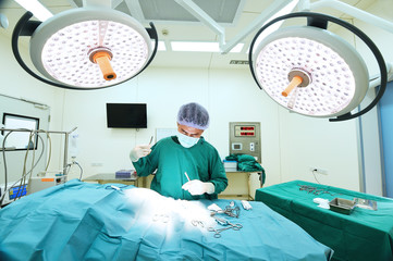 veterinarian surgery in operation room