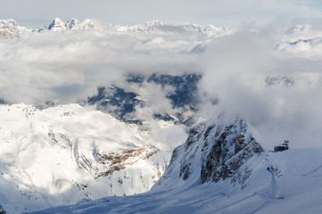 Fototapeta na wymiar Sunny view of Dolomites from Marmolada glacier of Arabba, Trentino-Alto-Adige region, Italy.