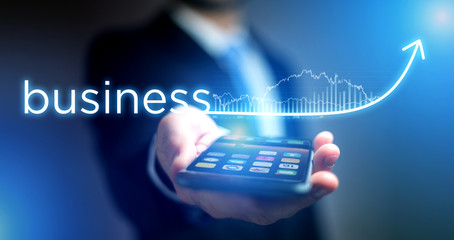 Concept of business success with arrow going up on a technology smartphone interface - Sales concept