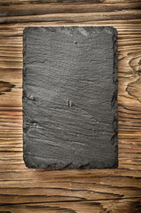 vertical slate board on wood