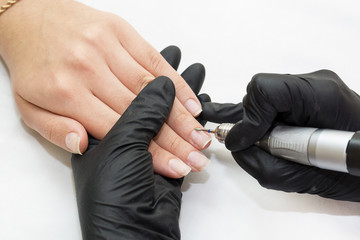 Woman doing manicure beauty salon 