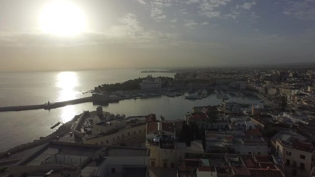 Flight over a small town with sea 2