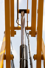 Chrome- plated hydraulic mechanism close-up shot