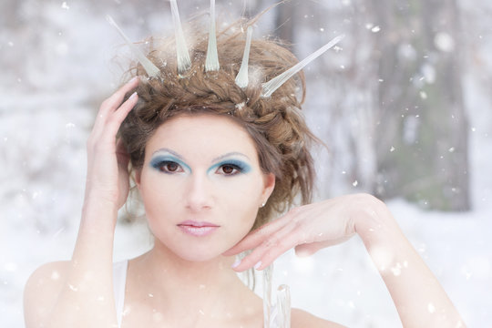 Winter woman, queen of snow - beautiful girl in winter makeup
