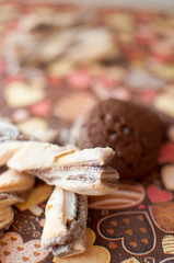 Cookies on dark napkin with image of hearts