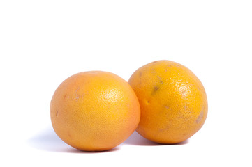 Two grapefruits isolated