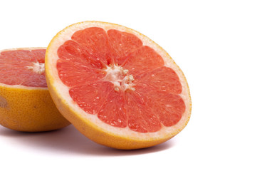 Fototapeta na wymiar Two Half cut grapefruit isolated on white background