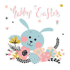 Easter rabbit, flowers and eggs.