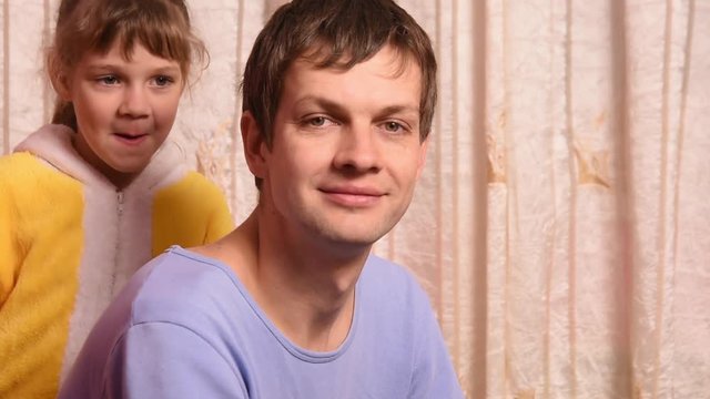 The five-year daughter went to the Pope and blew into his ear, Dad winced