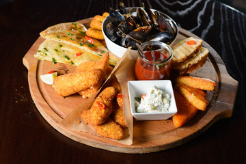 set includes mussels, chicken nuggets,stripsy and cheese pie