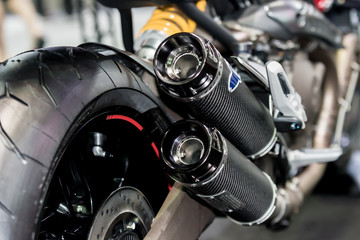 Fototapeta premium Closeup of exhaust or intake of racing motorcycle. Low angle photograph of motorcycle.